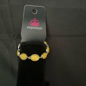 Silver bracelet with yellow stone